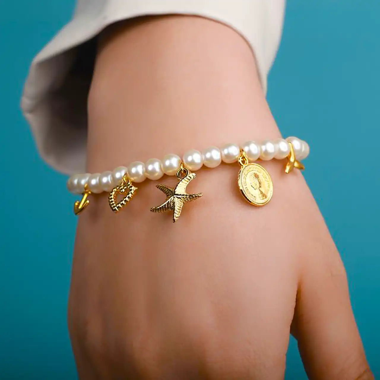 دستبند طلا مروارید زنانه