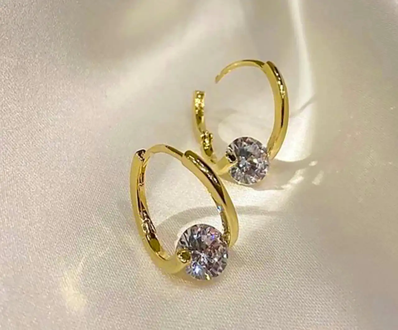 گوشواره حلقه ای کارشده طلا