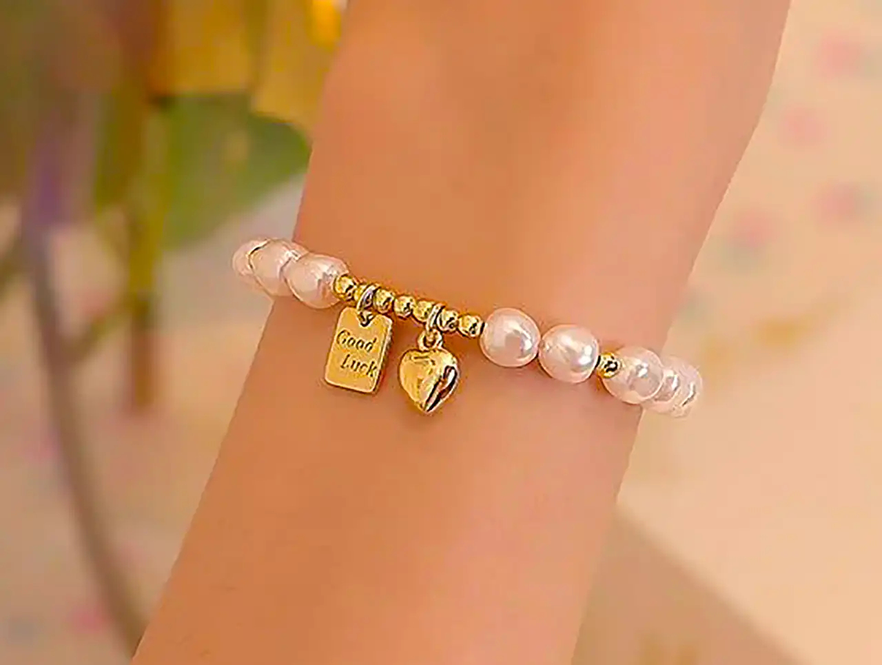دستبند طلا مروارید زنانه