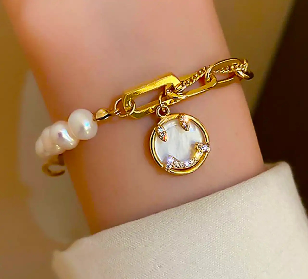 دستبند طلا مروارید زنانه