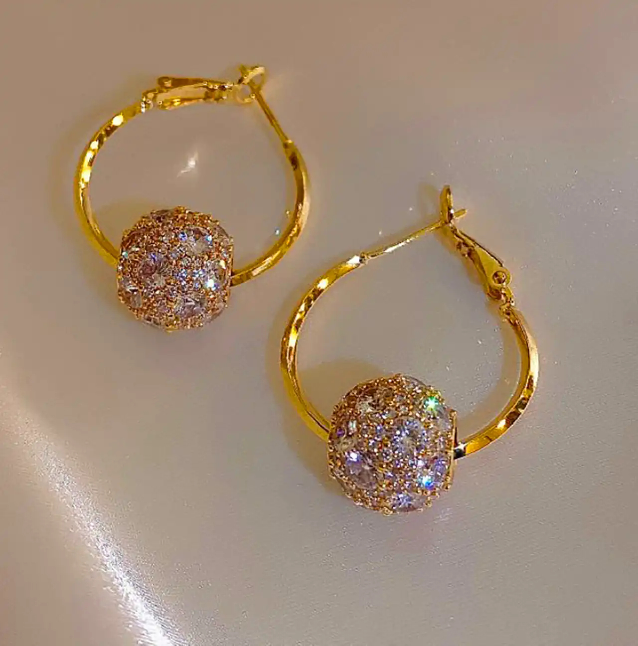 گوشواره حلقه ای کارشده طلا