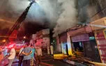 آتش‌سوزی مهیب در خیابان انقلاب / خوابگاه مجاور کارگاه چوب‌بری آتش گرفت!