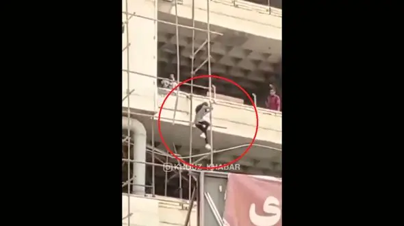 فیلم فرار دختر آبادانی از ریزش ساختمان متروپل / ترس از مرگ او را شجاع کرد