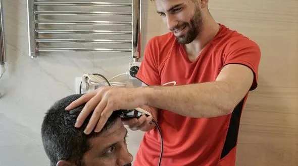 قهرمان کشتی آسیا آرایشگر شد