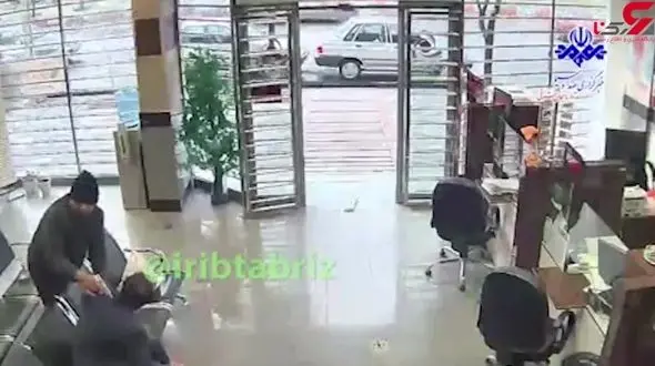 لحظه سرقت مرد مسلح  بمب گذار از بانک مسکن و موسسه اعتباری در تبریز + فیلم صحنه سرقت 