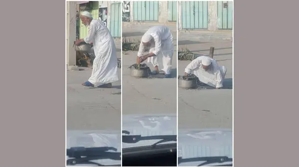 امام جمعه موقت گناوه در حال تمیز کردن ورودی فاضلاب + عکس