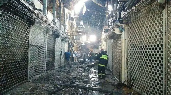 آتش سوزی 15 مغازه در بازار "زرگرهای" کرمانشاه مهار شد+فیلم و عکس