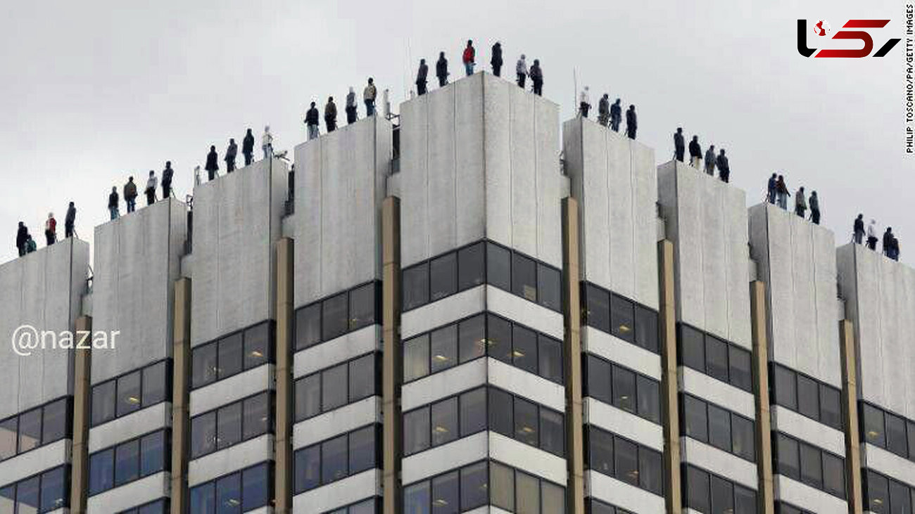 ماجرای عجیب نشان دادن خودکشی 84 تن از بالای پشت بام یک برج اداری +عکس