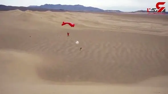 اقدام هیجان انگیز پرش با موتور کراس و فرود با چتر نجات!+فیلم