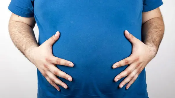 14 دلیل آب نشدن چربی شکم و پهلو