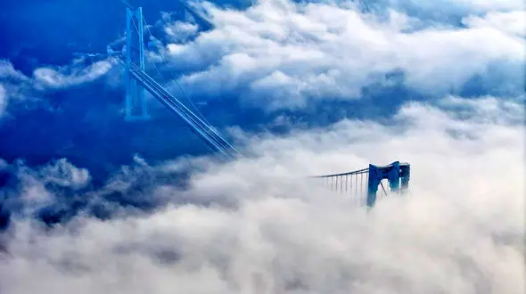 "China Unveils the World's Tallest Bridge, Revolutionizing Travel in Guizhou"
