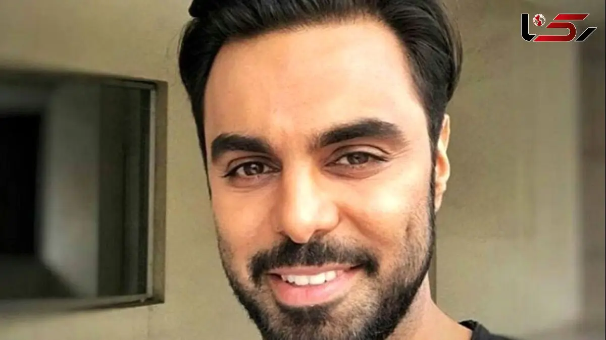 تیپ عجیب و ناهماهنگ مهدی ماهانی با جوراب چارخونه و کلاه بابا کرم / هر چی یه سازی میزنه