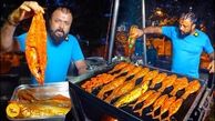 فیلم غذای خیابانی پادشاه ماهی سرخ شده بنگلور به این شکل ماهی ها را مزه دار و سرو می کند!