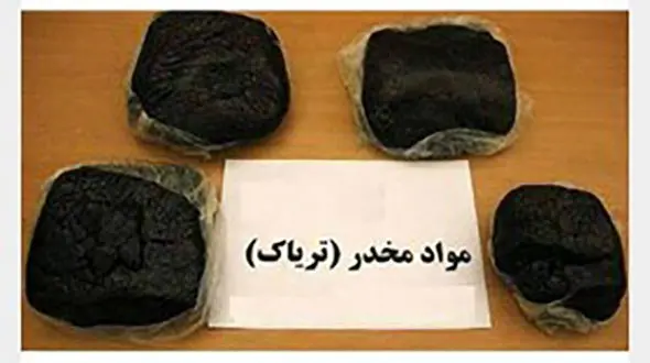 زن جوان رشتی با کوله پشتی پر از تریاک دستگیر شد +عکس