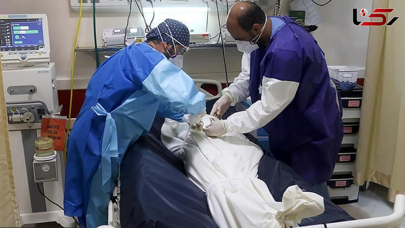  عکس کفن کردن کشته های کرونایی روی تخت بیمارستان مشهد / 800 کشته در یک روز! +  فیلم