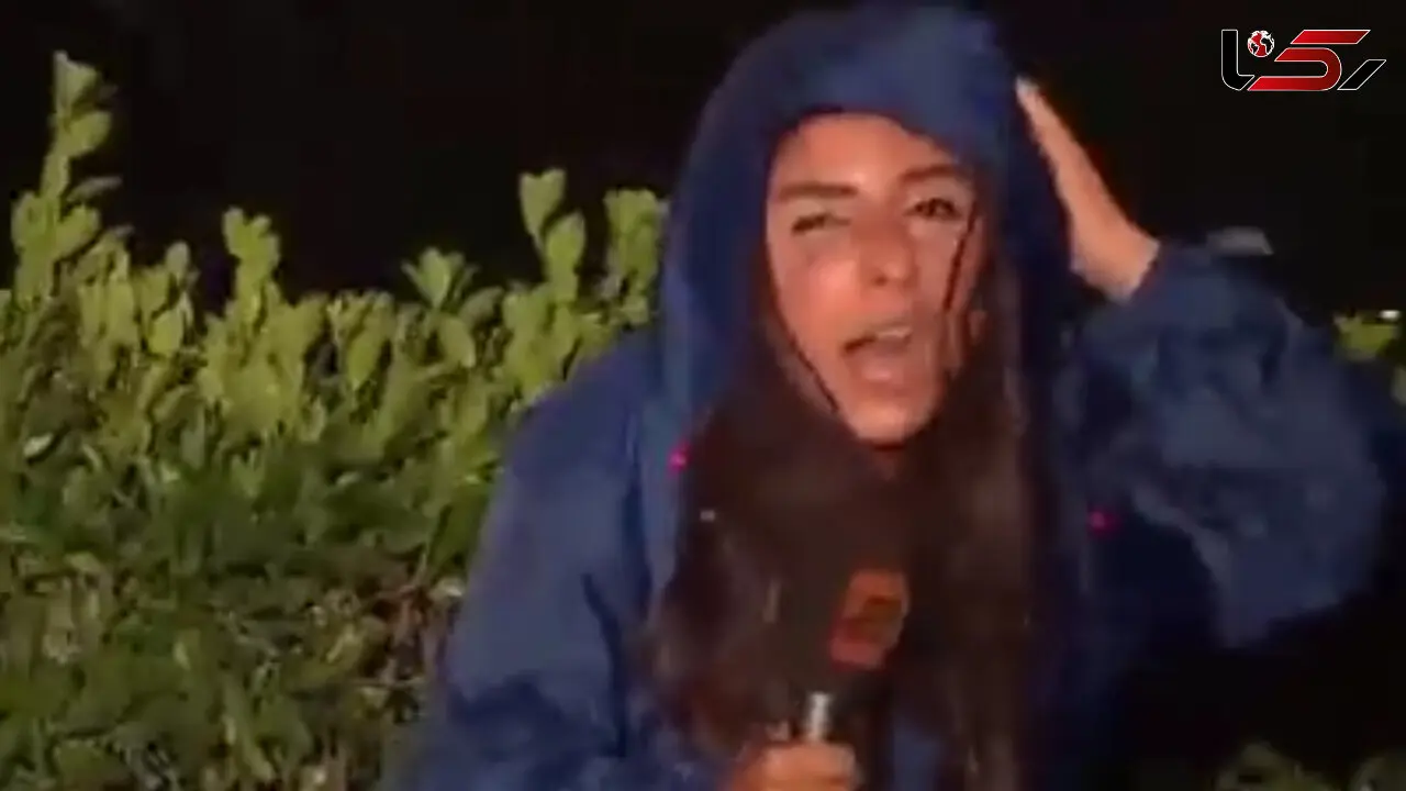 سماجت عجیب  خانم خبرنگار در هوای طوفانی + فیلمی بسیار جالب