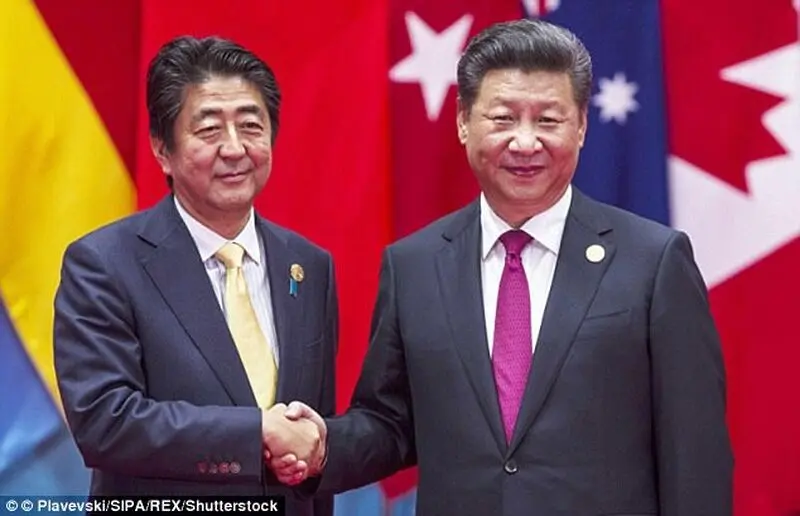 4EE471AD00000578-0-In_2014_a_photographed_handshake_between_President_Xi_and_Japane-a-16_1533632927581