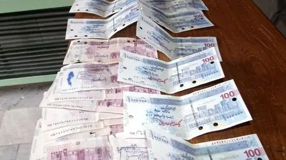 کشف چک پول‌های جعلی در کرمانشاه