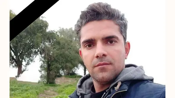 عکس محمد سرخی کارگر هفت تپه که صاعقه او را خشک کرد