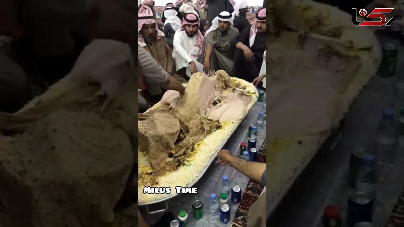 (ویدئو) لحظه برش زدن تماشایی شتر بریانی بزرگ با شمشیر در امارات
