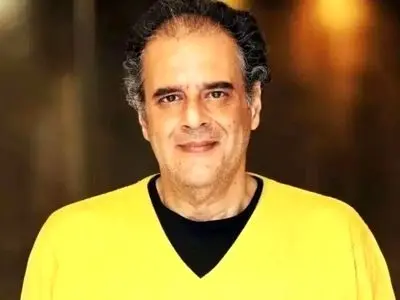 نگاهی به آشپزخانه شیک و دلباز هومن برق نورد، ستاره محبوب کمدی ایران و کابینت ها و میز چوبی ناهارخوری/ تَر و تمیز+عکس