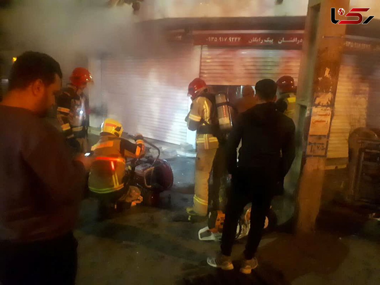 آتش سوزی مغازه سوپر مارکت در میدان عارف  قزوین +  عکس
