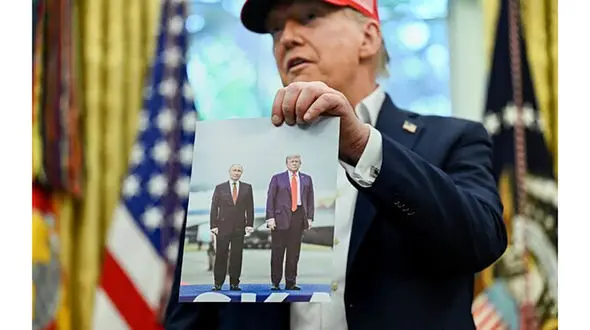 ترامپ : این عکس را پوتین برای من فرستاد / تا 2 هفته دیگر تکلیف روشن خواهد شد