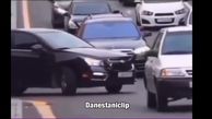 ببینید / جولان پراید در یکی از خیابان‌های آمریکا بین خودروهای فوق مدرن! + فیلم حیرت آور