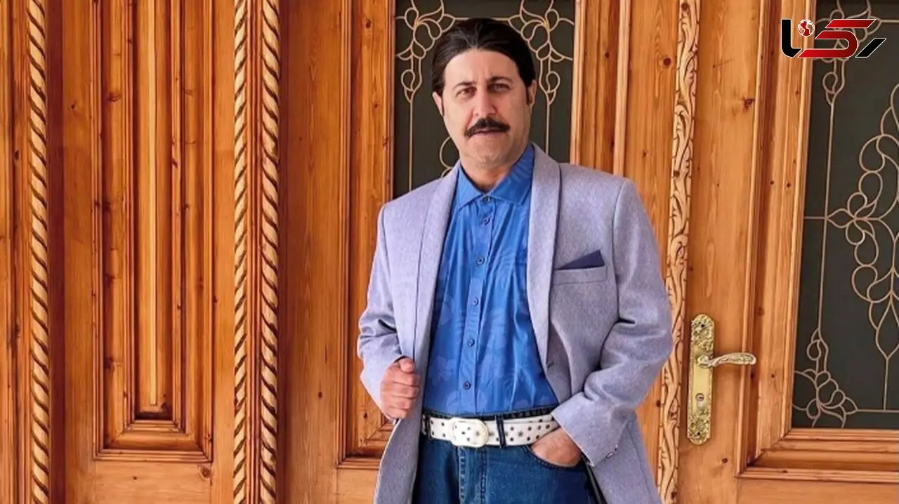 عکسی از رحمت امینی‌شالیکار هزارجریبی در کنار پسرش