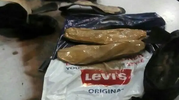 جاسازی هروئین در کفش مسافر+عکس