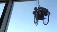 فیلم عجیب از صعود یک معلول به آسمانخراش با ویلچر