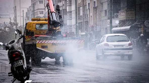 بارش اولین برف پاییزی در تهران + عکس ها