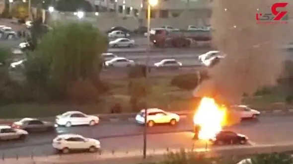 فیلم لحظه انفجار یک ماشین در غرب تهران! / راننده های نترس بی خیال از یک وجبی آن عبور می کردند!