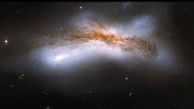 تصویری حیرت انگیز از یک خوشه کهکشانی