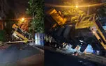 نجات معجزه‌آسا از فاجعه در تهران / جرثقیل غول‌پیکر روی ساختمان سقوط کرد + فیلم و عکس