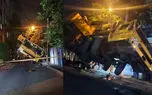 نجات معجزه‌آسا از فاجعه در تهران / جرثقیل غول‌پیکر روی ساختمان سقوط کرد + فیلم و عکس