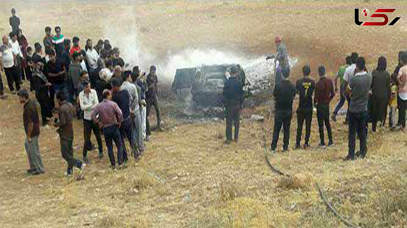 عکس هولناک /  2 تن داخل پژو در جاده اصفهان زنده زنده سوختند / باد شدید آتش را شعله ور کرد