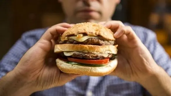 
علائم اعتیاد به غذا + راه حل درمان 
