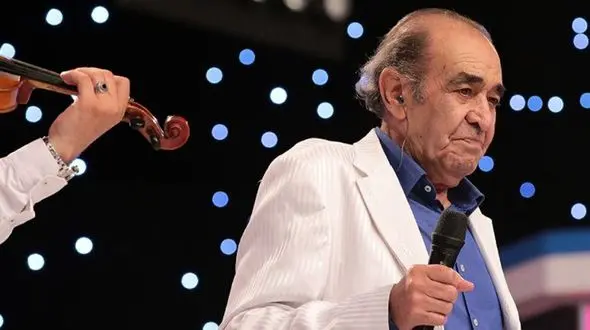 واکنش ایرج خواجه امیری به حرکت نوازنده خیابانی + فیلم