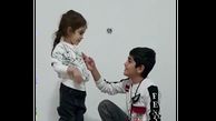 صدای حیرت انگیز پسر بچه ناشناس ایرانی جهانی شد + فیلم آواز خوانی برای خواهرش !