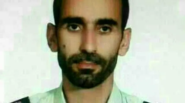 عکس هنگام انتقال رئیس کلانتری مرکزی دره شهر به بیمارستان قبل از شهادت