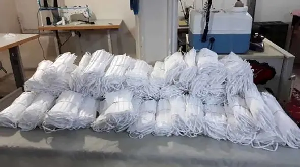 کشف ماسک‌های غیر بهداشتی از یک کارگاه خیاطی در پاکدشت