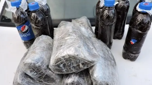 کشف 19 کیلو تریاک در زیر بار انار