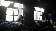 عملیات نجات 16 زن و مرد از آتش سوزی یک مجتمع مسکونی در مشهد + عکس نجات