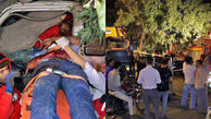 محبوس شدن راننده کامیونت در لابلای یک درخت تنومند در مشهد