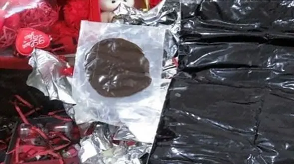 تریاک در بسته ولنتاین در خط کرمانشاه به سوئد + عکس 