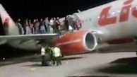 شوخی احمقانه یک مسافر در هواپیما11 مجروح بر جای گذاشت