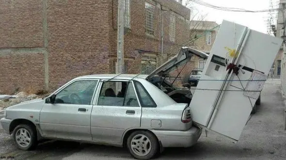 عکس ناباورانه از حمل یخچال ساید بای ساید  در صندوق عقب پراید 