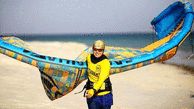 Female sailing champion on the podium