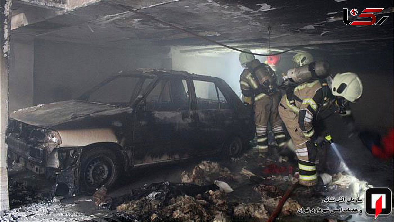 آتش سوزی خودروی سواری در پارکینگ ساختمان مسکونی + عکس